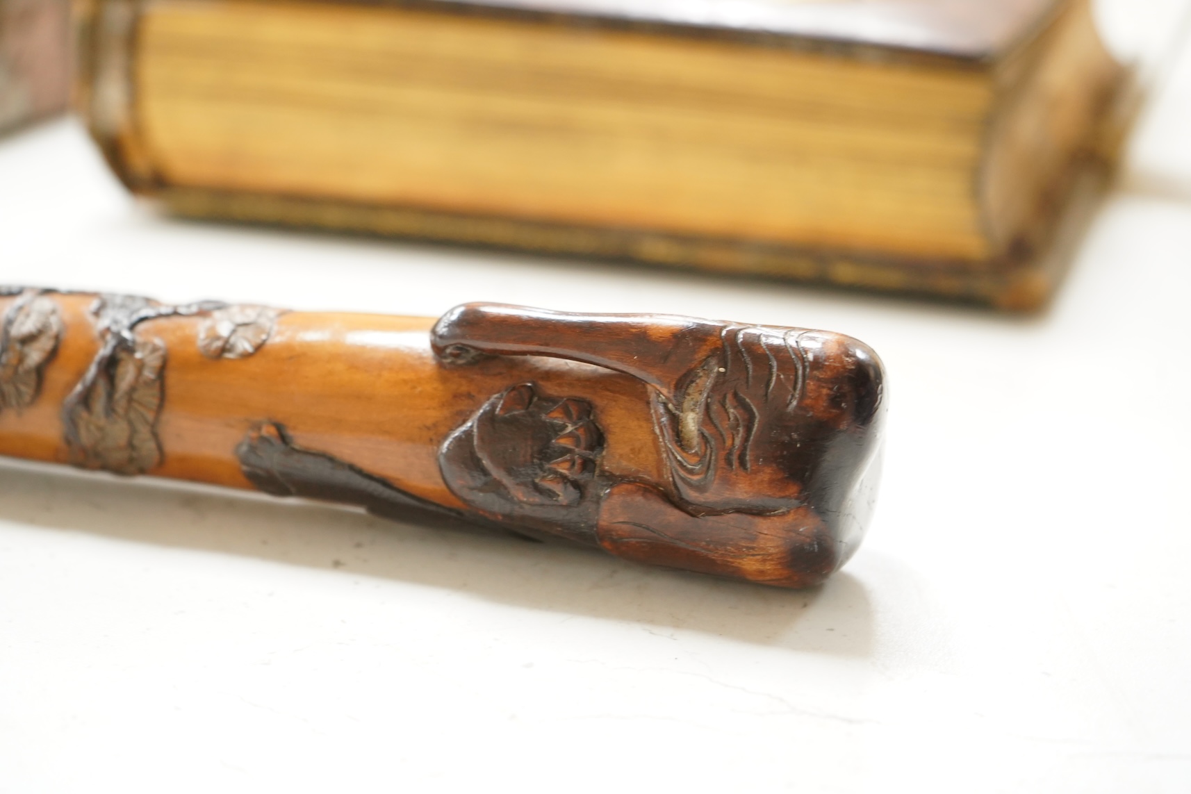A late 19th century Japanese carved walking stick, with elephant handle, 95cm high
